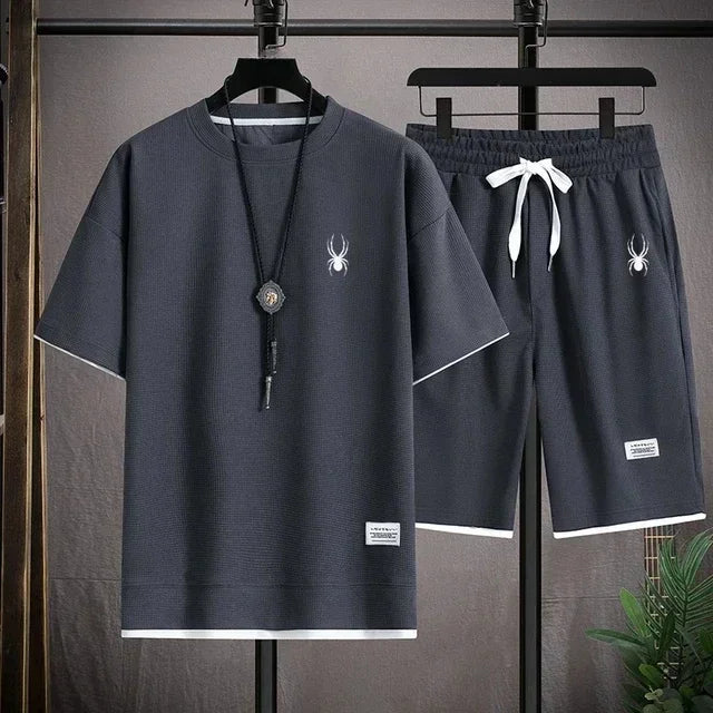 Camiseta de manga curta masculina e shorts esportivos