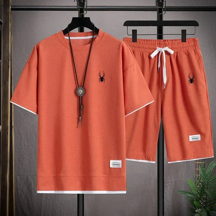 Camiseta de manga curta masculina e shorts esportivos